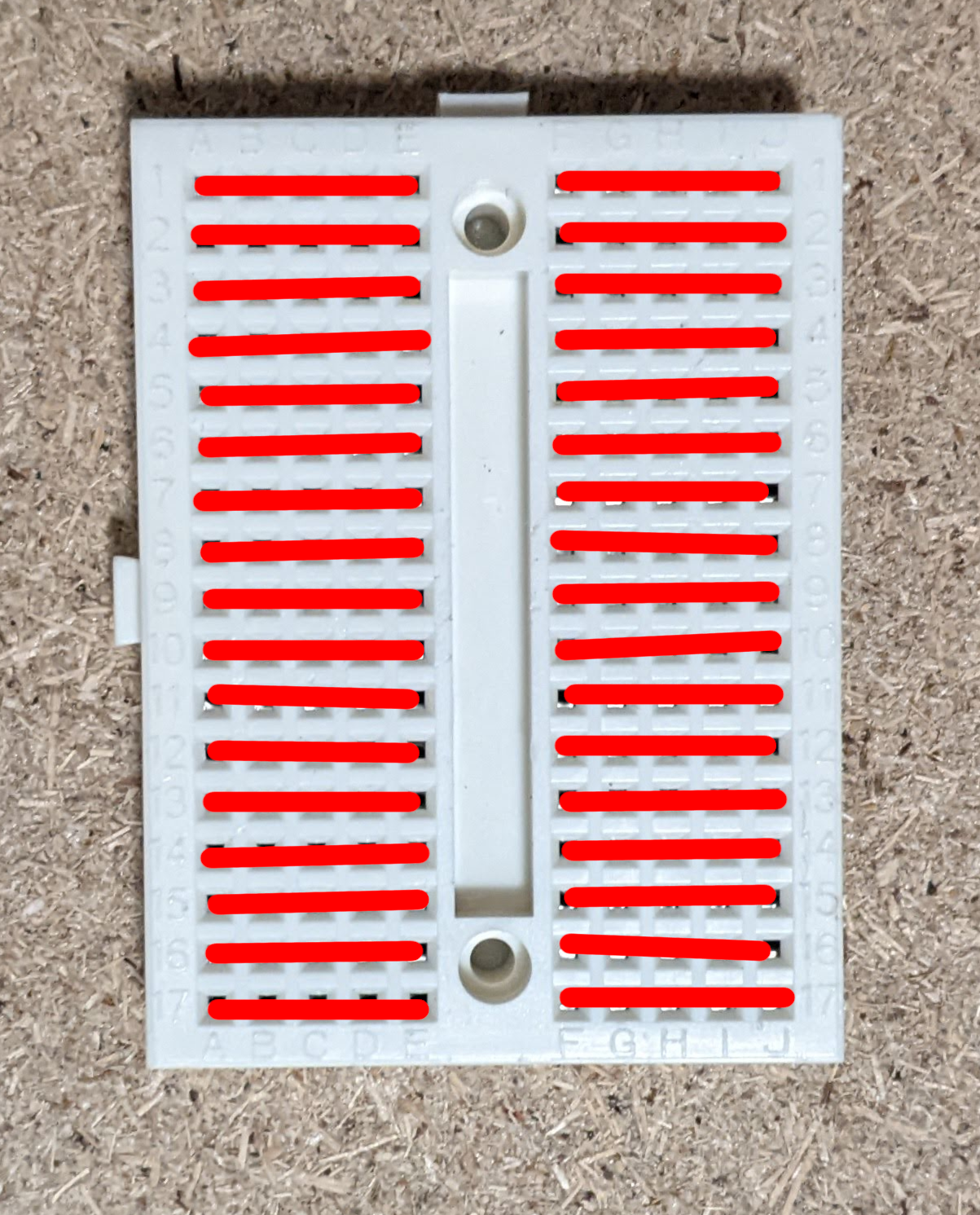 image of breadboard with connected rows highlighted